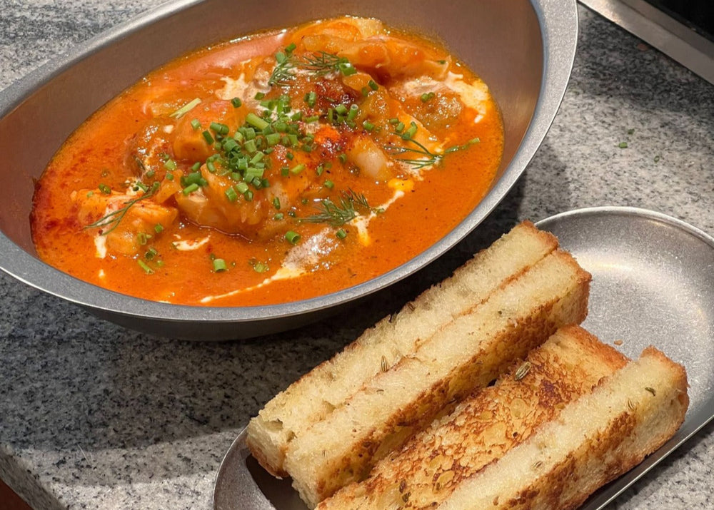 Seafood soup with toasted bread