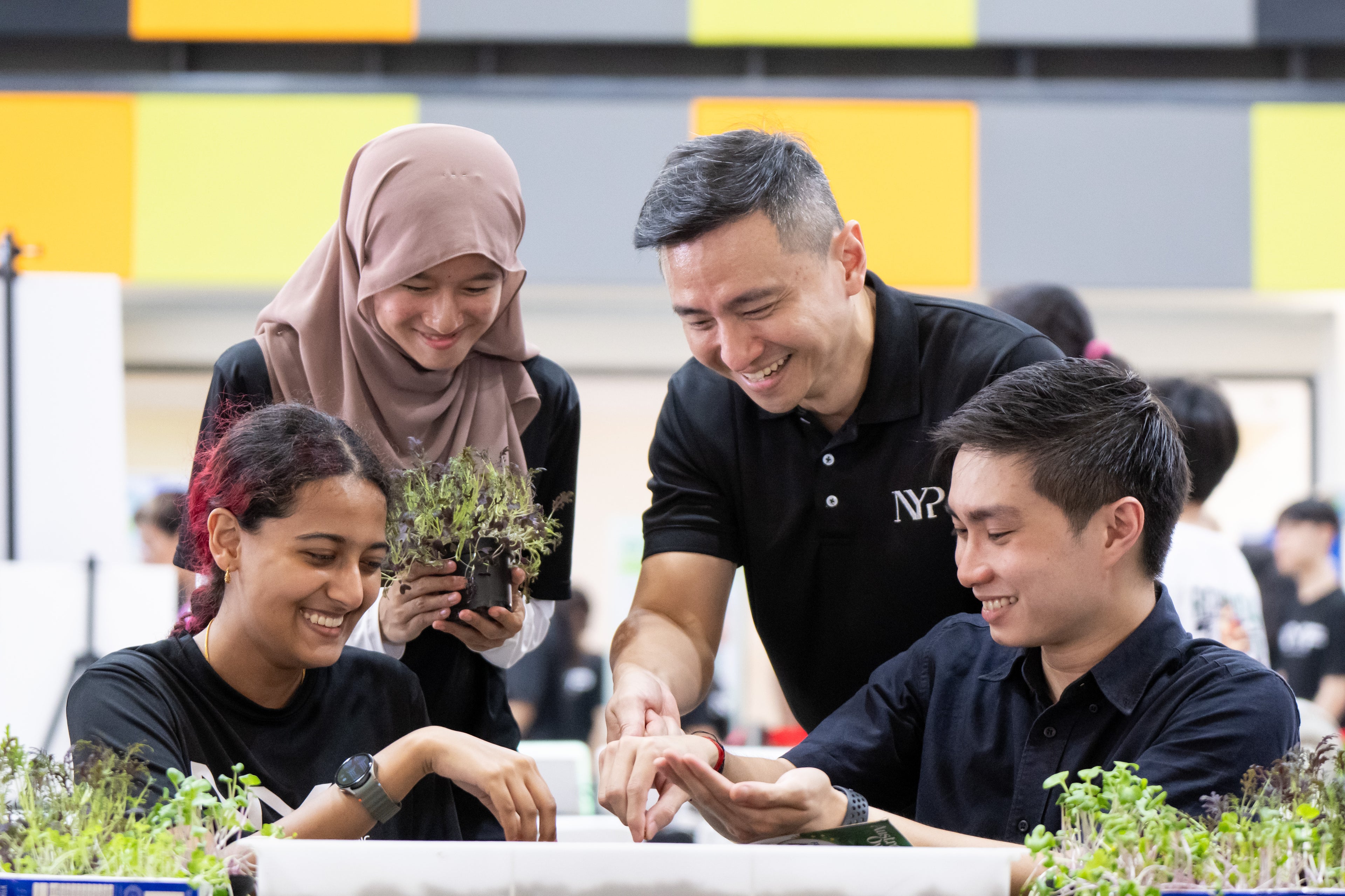 Founder Jason interacting with participants during Nanyang Polytechnic's EcoFest 2024