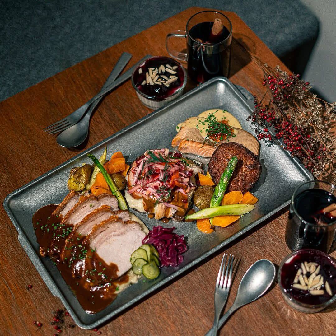 Platter with various roasted meats and vegetables