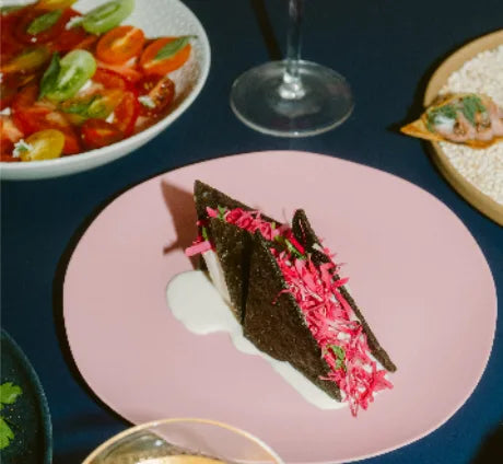 Seaweed ice cream sandwich with edible flowers